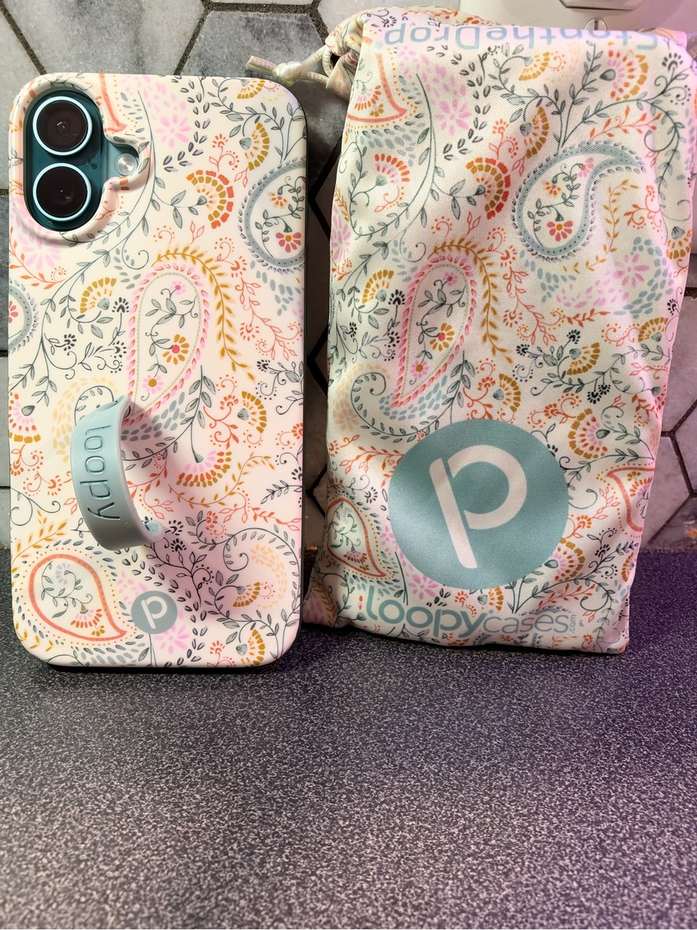 iPhone 16 Plus Loopy case- also come with the bag